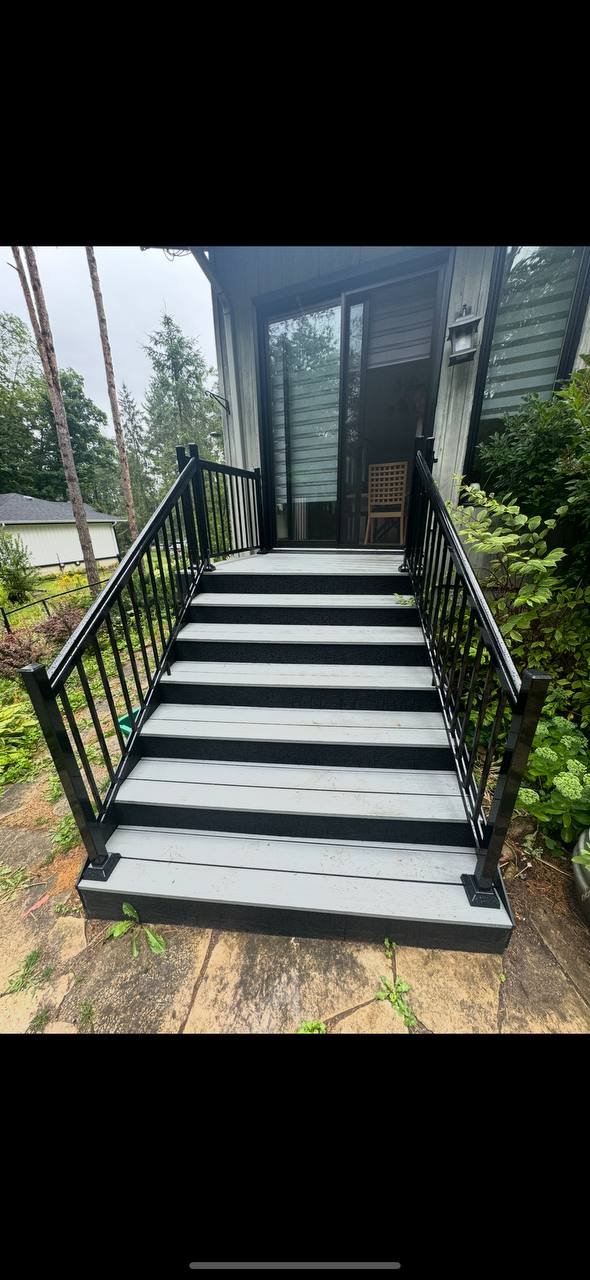 Composite stairs with black aluminum railing